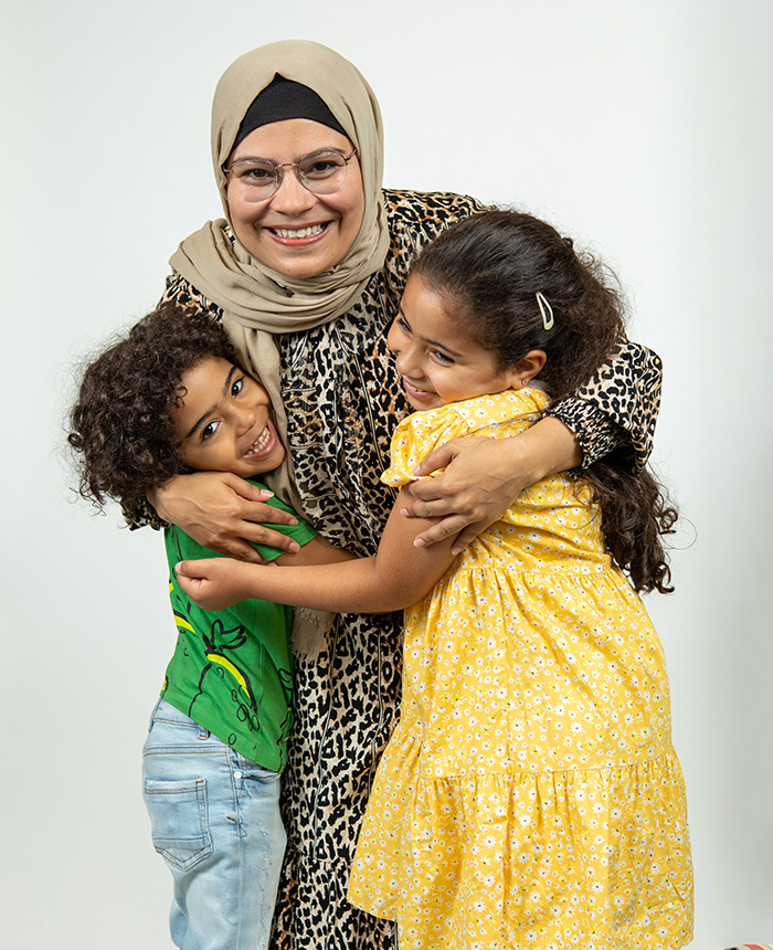GCSE maths student, Awatef, celebrates with her children gcse awatef